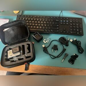 GoPro hero 3 plus silver edition with waterproof case and accessories .